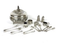 Lot 1260 - A miscellaneous collection of modern silver 
comprising silver: a continental dish and cover chased with flowers and scrolls on a matt ground; six continental teaspoons with dogs heads; two napkin rin
