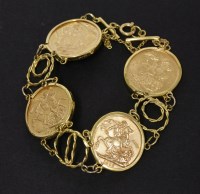 Lot 1023 - A four sovereign bracelet