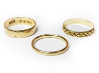 Lot 1167 - Three 18ct gold wedding rings