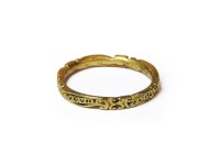 Lot 1183 - A gold memorial ring