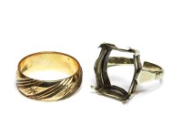 Lot 1186 - A 9ct gold diamond cut wedding ring