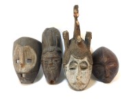 Lot 1467 - A quantity of carved African tribal masks