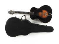 Lot 1543 - A 1938 Radiotone acoustic guitar