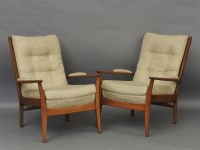 Lot 1773 - A pair of Cintrique teak armchairs