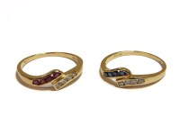 Lot 1142 - A pair of 18ct gold interlocking rings