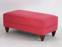 Lot 1650 - A contemporary pink upholstered pouffe