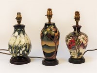 Lot 1351 - Three Moorcroft pottery lamp bases