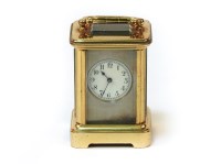 Lot 1291 - A small brass carriage clock
8cm high