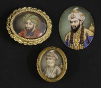 Lot 261 - Three Indian oval portrait miniatures on ivory