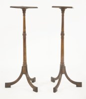 Lot 522 - A pair of mahogany torchères