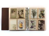 Lot 1296 - A large album of over 200 Edwardian postcards