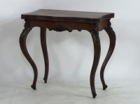 Lot 1754 - A 19th century continental flame mahogany fold over card table