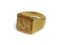 Lot 1128 - A gold signet ring with engraved initials and textured shoulders