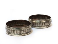 Lot 1256 - A pair of Victorian silver wine coasters