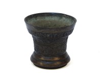 Lot 1310 - A small bronze mortar