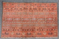 Lot 1821 - A hand knitted Persian rug