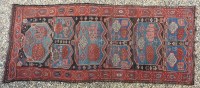 Lot 1818 - A hand knotted Caucasion rug