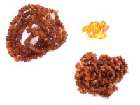 Lot 207 - Two rows of graduated amber chip necklaces