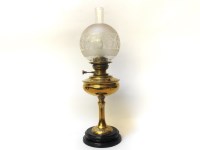 Lot 257 - A brass oil lamp