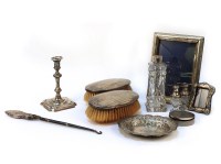 Lot 1255 - A collection of various silver items to include photograph frames