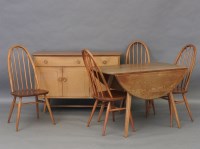 Lot 1690 - Elm Ercol dining suite