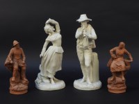 Lot 1302 - A pair of terracotta fisherman and his wife
