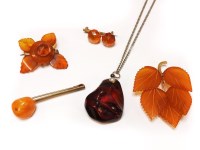 Lot 1146 - A Russian gilt metal amber leaf brooch