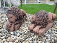 Lot 3037 - A pair of terracotta lions