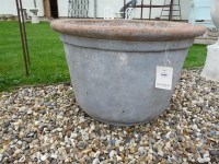 Lot 3046 - A large circular faux stone planter