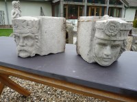 Lot 3048 - A pair of cast stone corbels of a king and queen