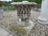 Lot 3009 - A Haddonstone basket weave garden urn