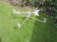 Lot 3085 - A cast iron N.S.E.W. weathervane