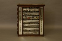 Lot 1520 - A vintage 'Ogden's Ltd Cigarettes' shop dispenser