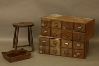 Lot 2055 - An oak bank of four drawers