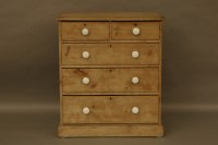 Lot 2056 - A Victorian pine chest of two short above two long drawers