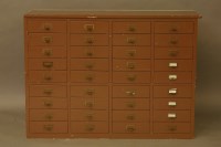 Lot 2150 - A painted pine bank of drawers