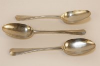 Lot 1039A - Three early 18th century silver table spoons