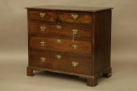 Lot 2226 - An 18th century oak chest of two short and two long drawers