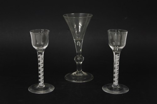 Lot 1165 - Two similar Georgian double air twist wine glasses