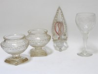 Lot 1298 - A pair of cut glass urns