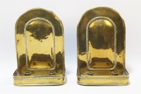 Lot 1530 - A pair of brass candle sconces