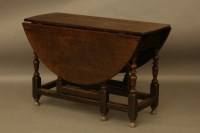 Lot 2248 - An oak gateleg table