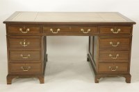 Lot 2205 - A mahogany pedestal desk of nine drawers