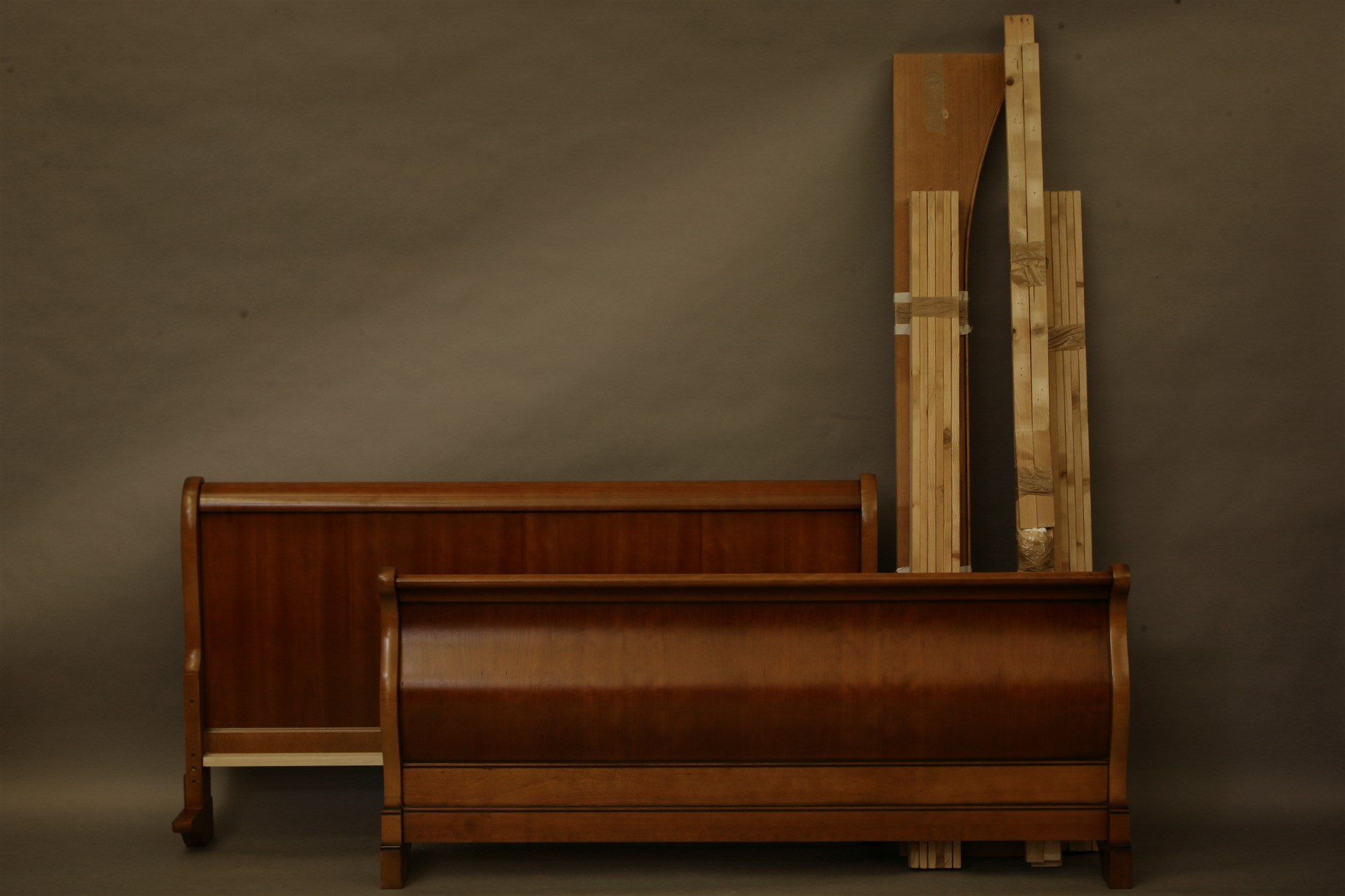 Lot 2155 A contemporary cherry wood Kingsize sleigh