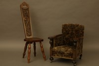 Lot 2077 - A child's oak armchair together with an oak spinning chair (2)