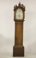 Lot 2206 - An oak longcase clock