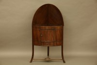 Lot 2124 - A George III mahogany corner wash stand