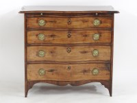 Lot 1743 - A George III serpentine mahogany chest of four long drawers