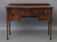 Lot 1787 - A George III design mahogany serpentine serving table