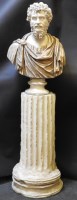 Lot 1597 - A composition bust of a Roman on a column